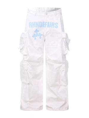 White cargo pants with blue graphic design and multiple pockets.