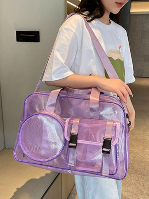 Purple PVC travel bag with multiple pockets and a round mesh pouch.