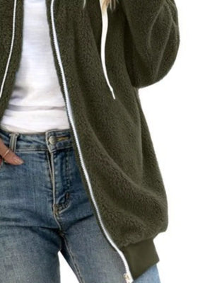 Army green fleece zip-up hoodie with white zipper and drawstring, worn with jeans.