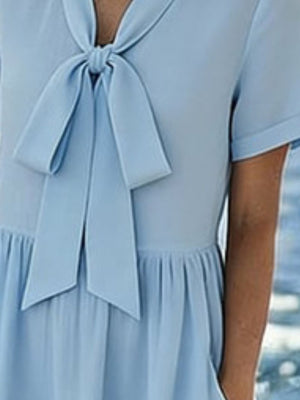 100% polyester Care instructions: Machine wash cold midi dress in Light Blue with A-line silhouette