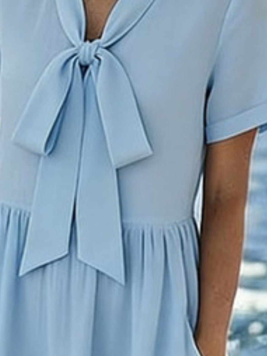 100% polyester Care instructions: Machine wash cold midi dress in Light Blue with A-line silhouette