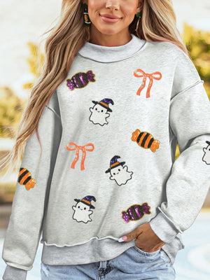 light gray sweatshirt with graphic and mock neck