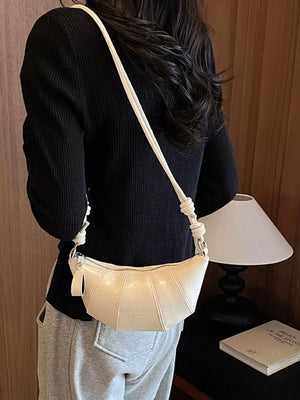 crossbody bag in ivory with stitched details and small