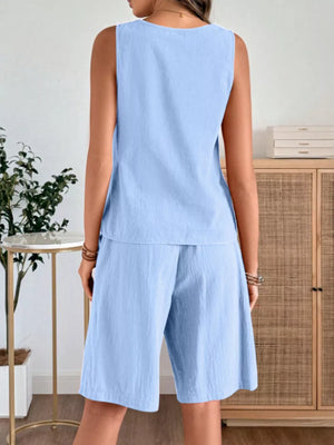 Sky blue relaxed fit tank and shorts set with a round neckline and wide leg shorts.