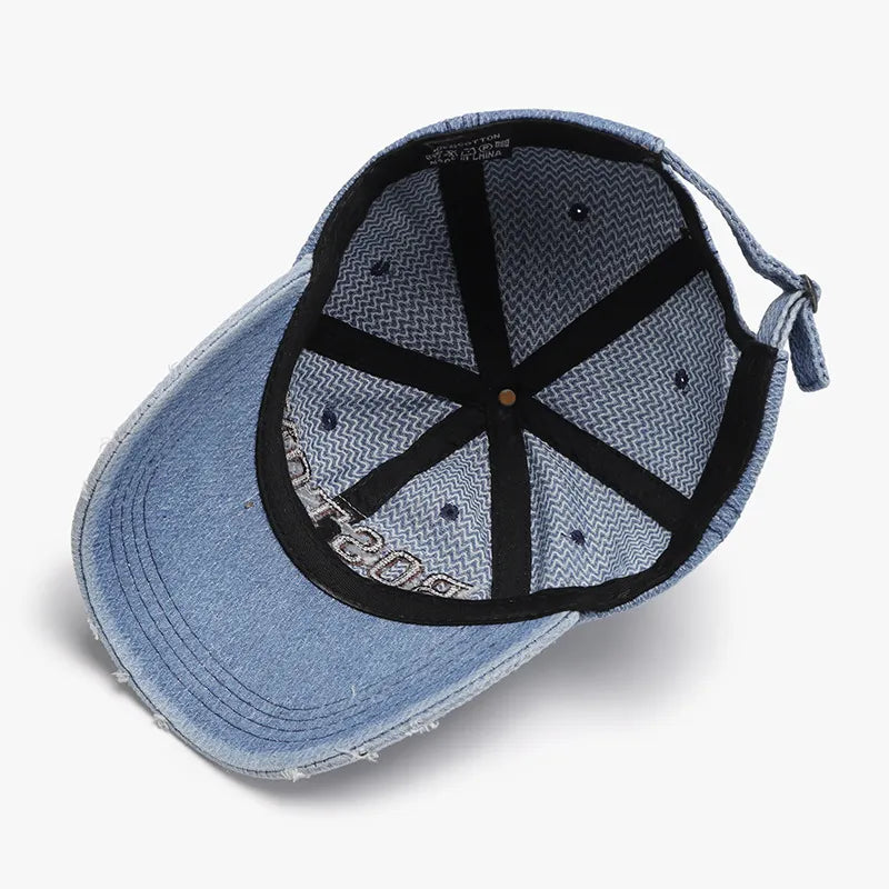 Distressed light wash denim baseball cap with embroidered Boston text.