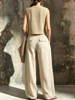 85% polyester, 15% linen Care instructions: Machine wash cold crop top and cargo pants set in beige with relaxed silhouette