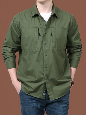 Men's relaxed fit military green cotton button-front shirt with dual chest pockets.