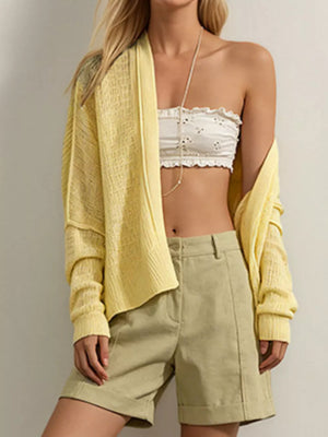 100% Acrylic Care instructions: Machine wash cold cardigan in Apricot with relaxed silhouette