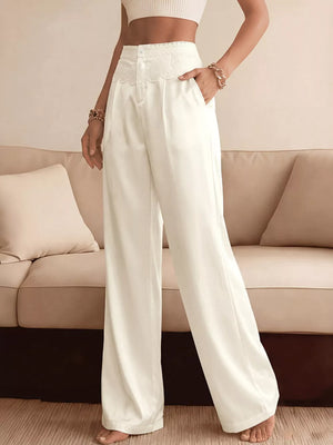 Lace-trimmed high-waist wide-leg pants in beige with pockets.