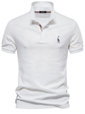 White piqué polo shirt with giraffe embroidery and striped collar detail.
