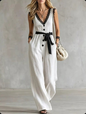 jumpsuit in off-white featuring lace trim and relaxed fit