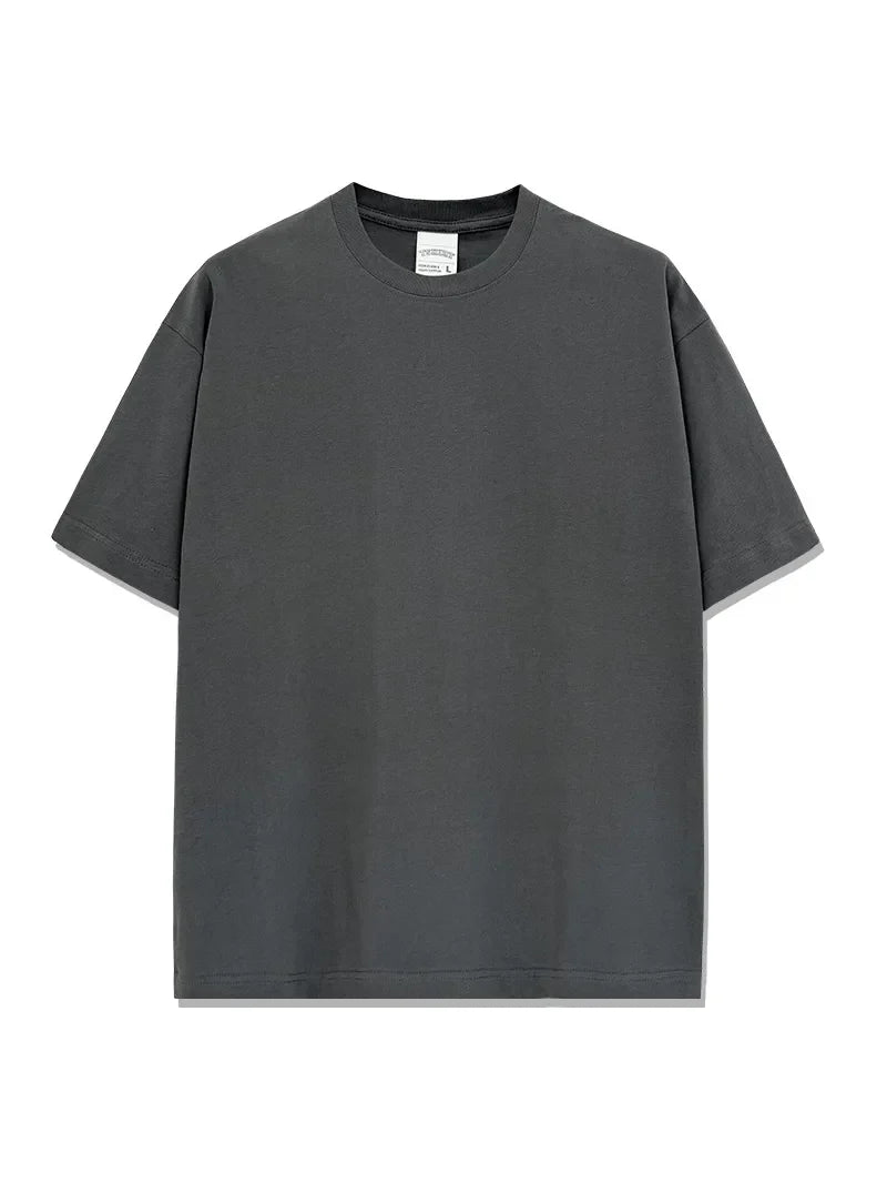 Oversized crew neck t-shirt in gray with acid wash effect and short sleeves.
