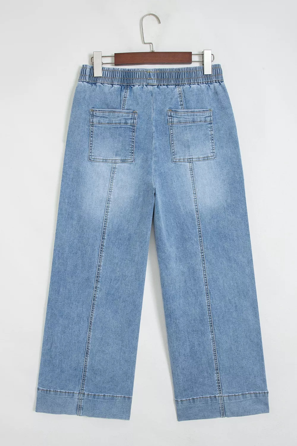 wide-leg jeans in light blue with drawstring waist and ankle-length