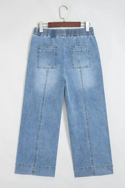 wide-leg jeans in light blue with drawstring waist and ankle-length