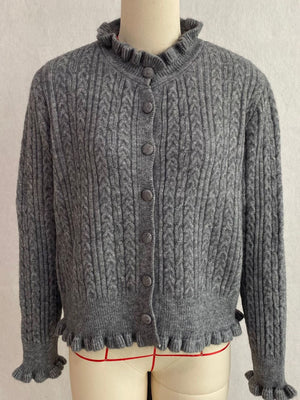 Cable-Knit Ruffle-Trim Cardigan in Apricot Color with cable-knit