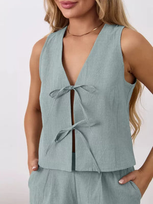 Blue cotton tie-front sleeveless top and shorts set with V-neckline.