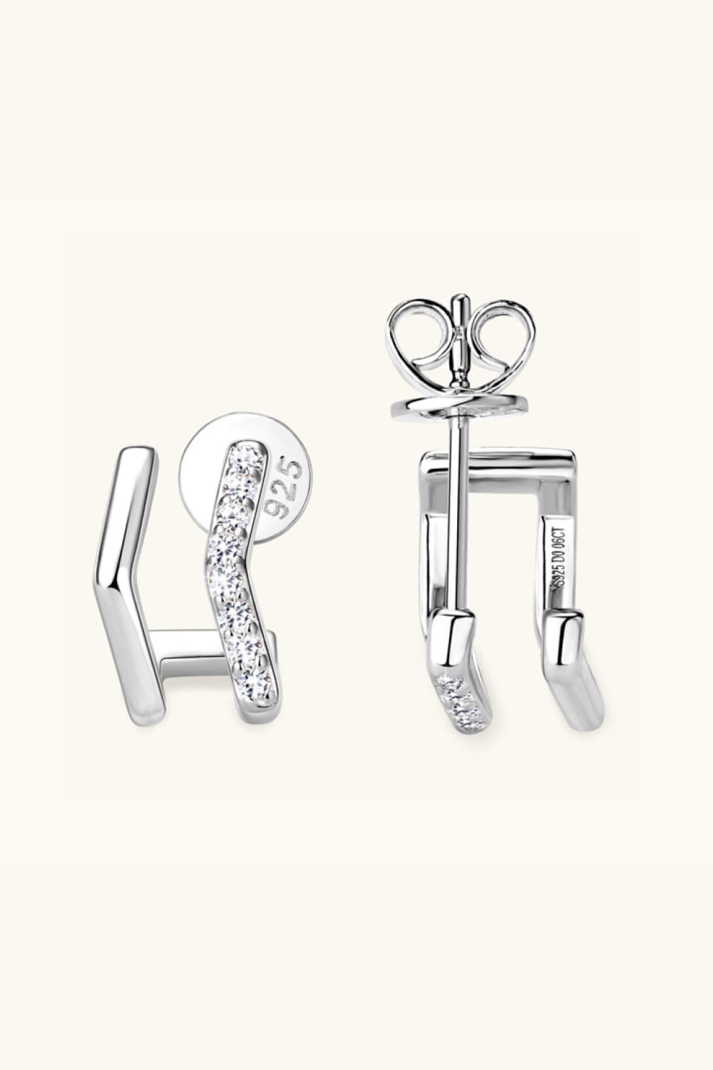 Geometric pavé silver ear jackets with 925 sterling silver and cubic zirconia accents.