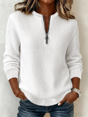 white sweatshirt with waffle-knit and mock neck