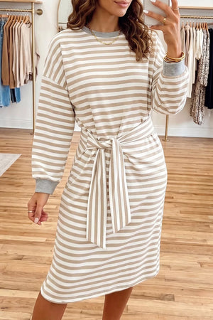 ivory shift dress featuring tied waist and striped