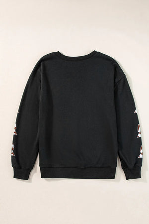Black sweatshirt with scripted sleeve embellishments and crew neck.