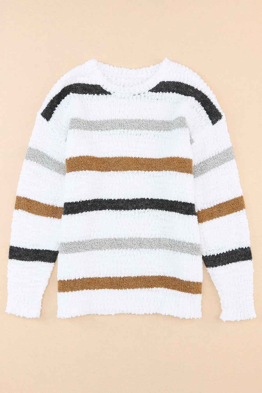 Textured stripe slouchy knit sweater in white with brown, grey, and black stripes.