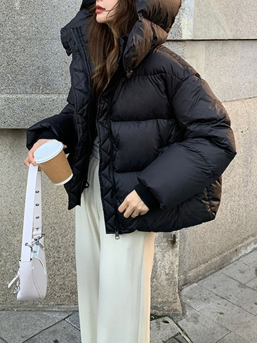 Black puffer jacket with hip-length and zip-front