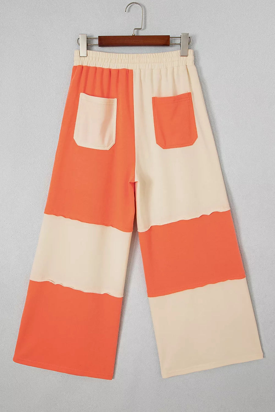 wide-leg pants in Orange with color-block and drawstring waist