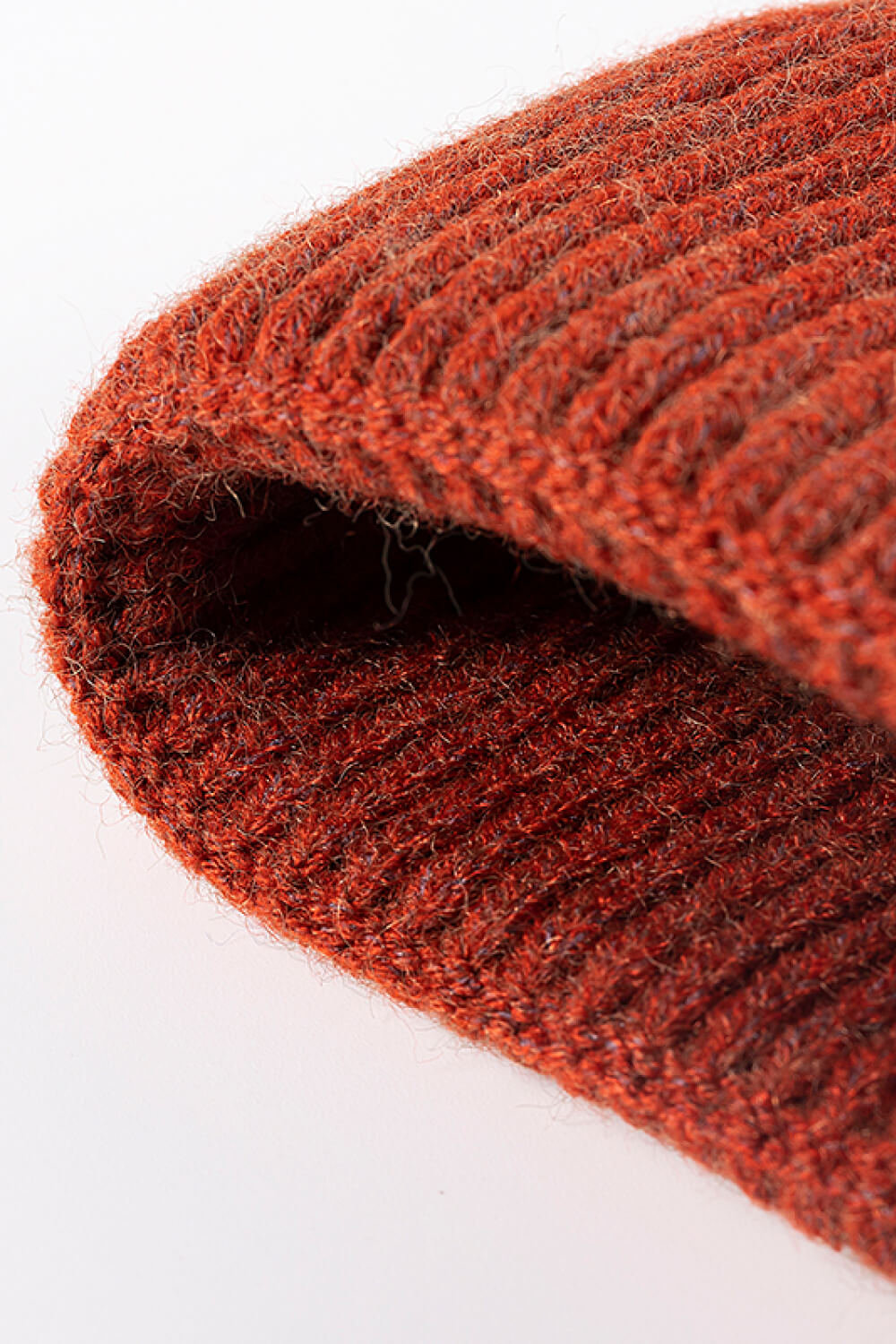 New York Patch Ribbed Beanie in Rust, acrylic knit with ribbed texture.