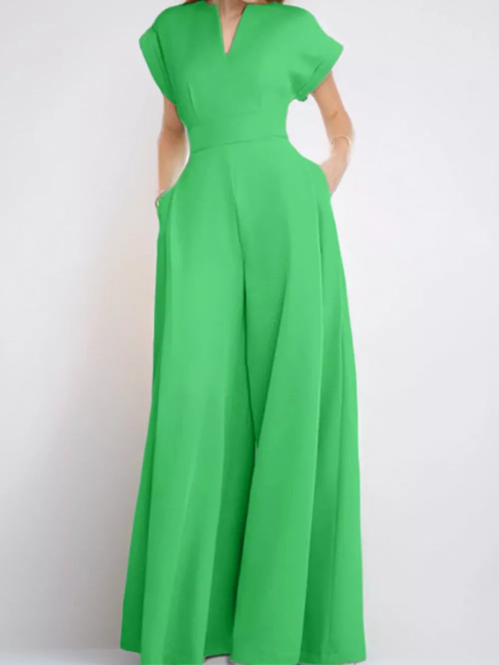 Neon green wide-leg romper with pockets and notched neckline.