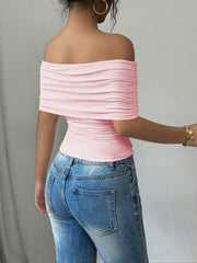 Pink asymmetrical ruched off-shoulder top with a bandeau neckline.