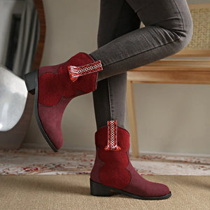 Burgundy suede and felt ankle boots with embroidered detail and fringe.