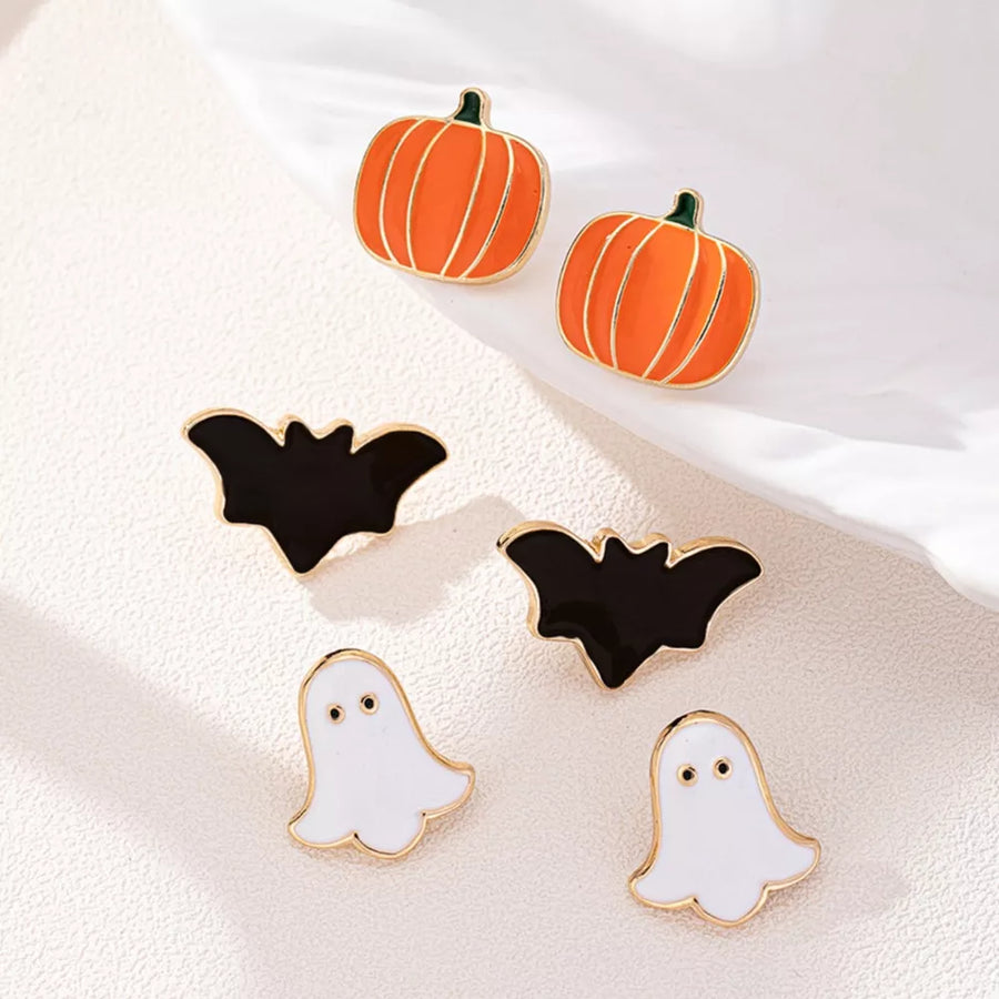 white earrings featuring stud earrings and novelty
