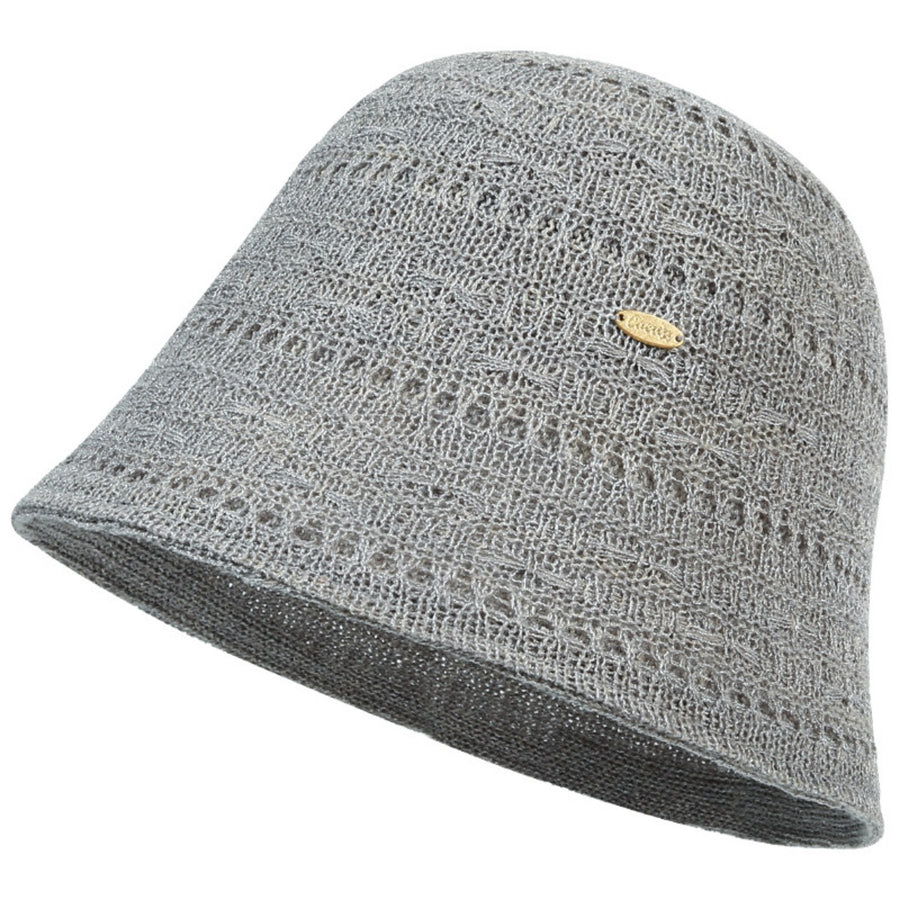 Gray knitted bucket hat with open weave pattern and gold logo detail.