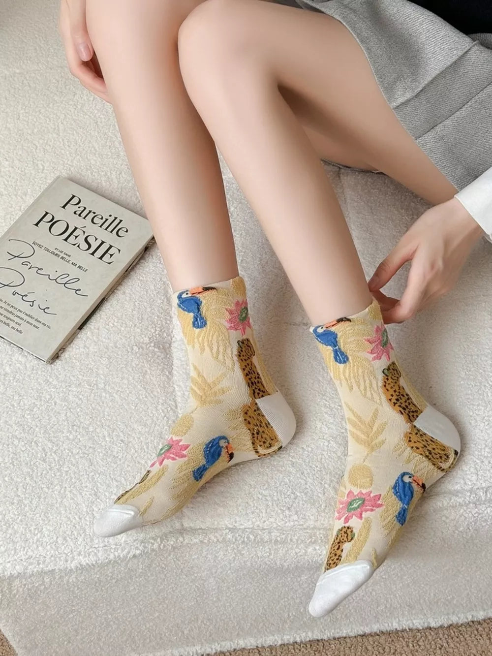 pale yellow socks with leopard-print, toucan, floral and N/A