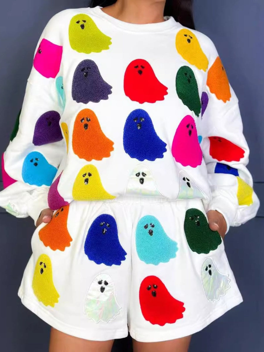 White loungewear set with colorful ghost appliqués and beaded eyes