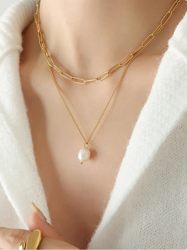 Gold layered necklace with paperclip chain and single pearl pendant