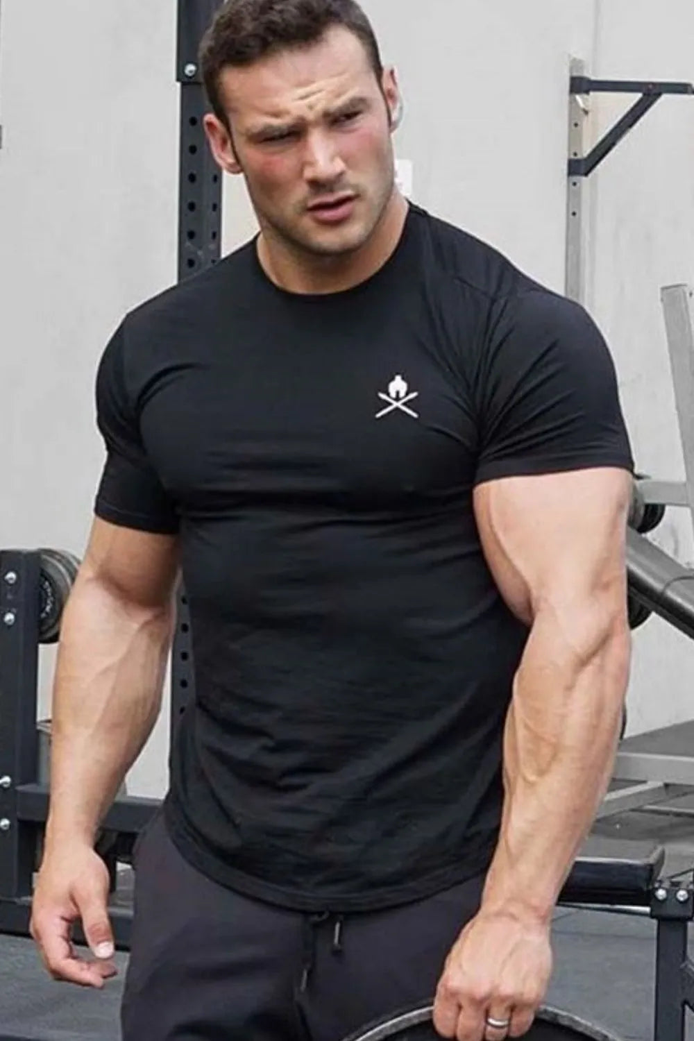 Black performance fit t-shirt with white logo detail on chest