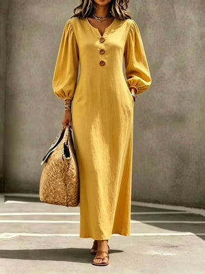 maxi dress in mustard yellow featuring buttoned and relaxed fit