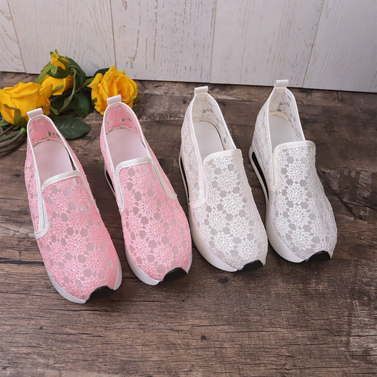 Floral lace slip-on sneakers in pink and white with chunky soles