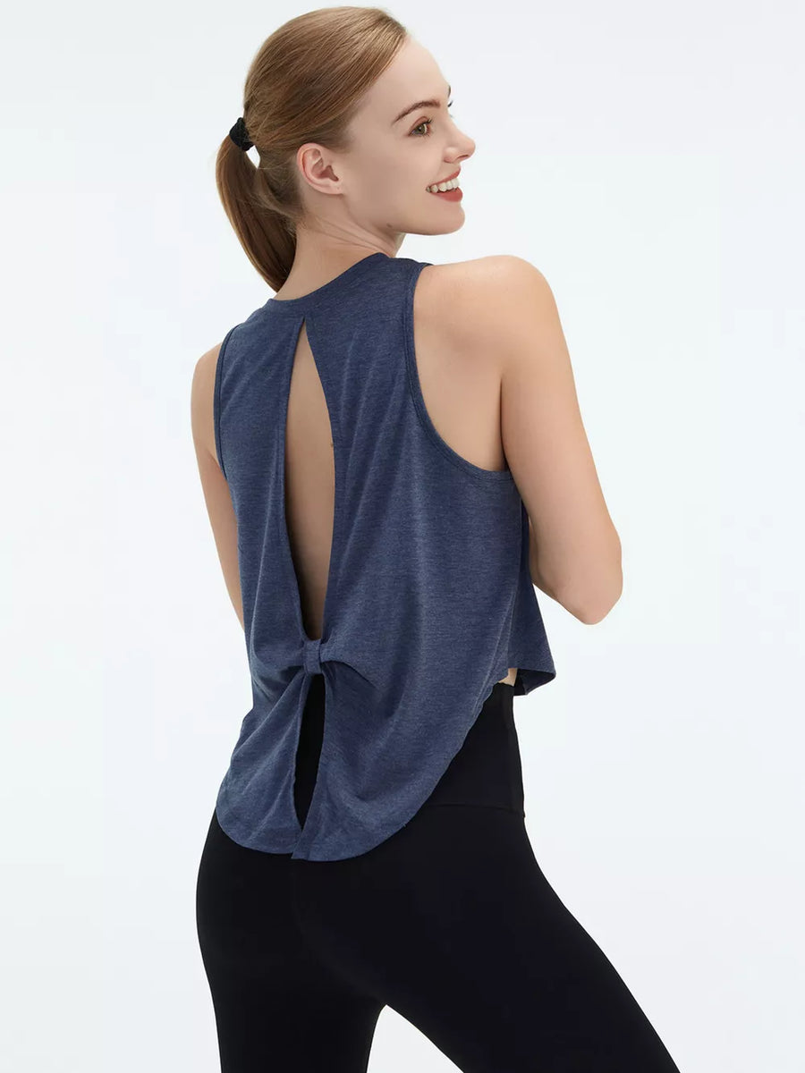 Blue heathered knit tank top with open back and tie detail.