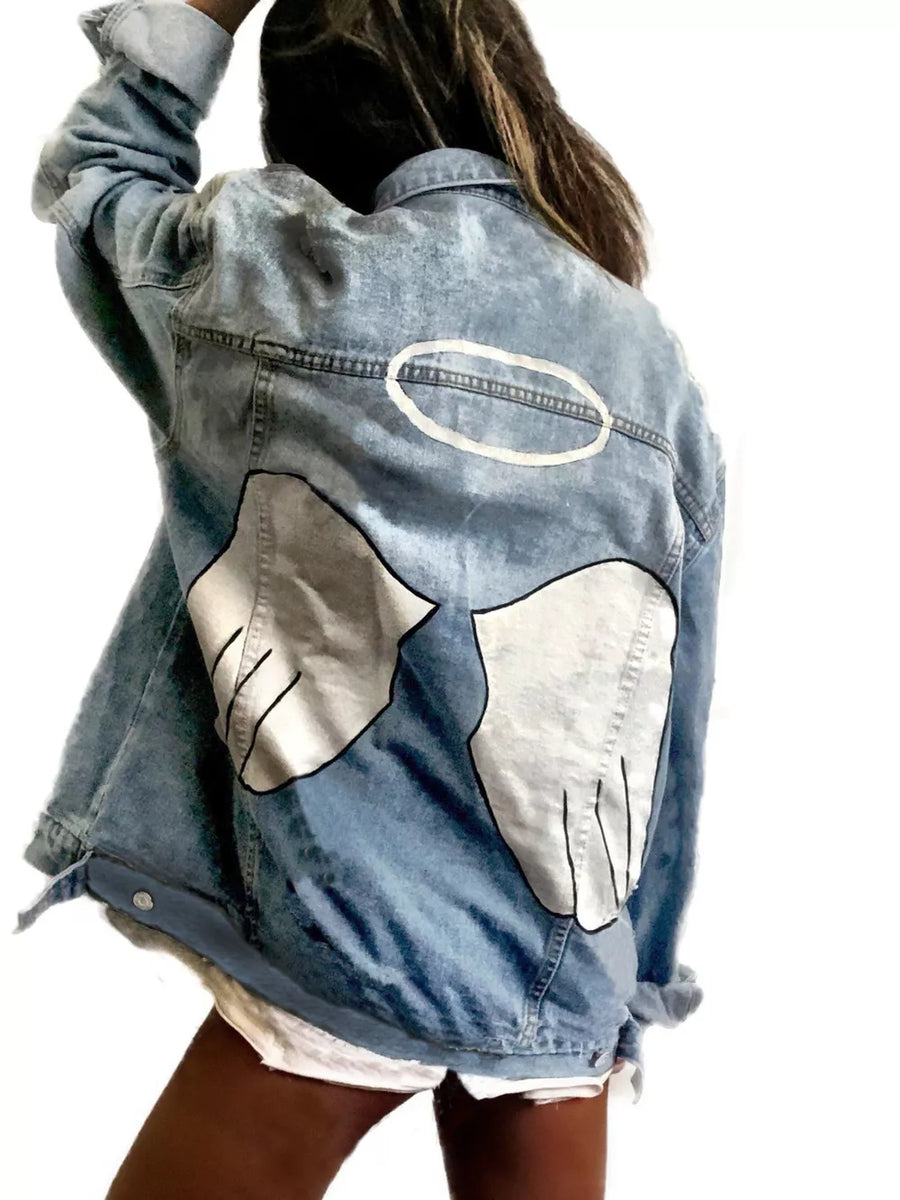 denim jacket in white with graphic print and oversized