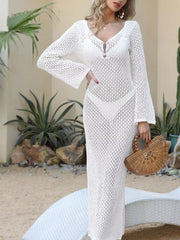 White openwork maxi cover-up dress with long bell sleeves and a V-neckline.