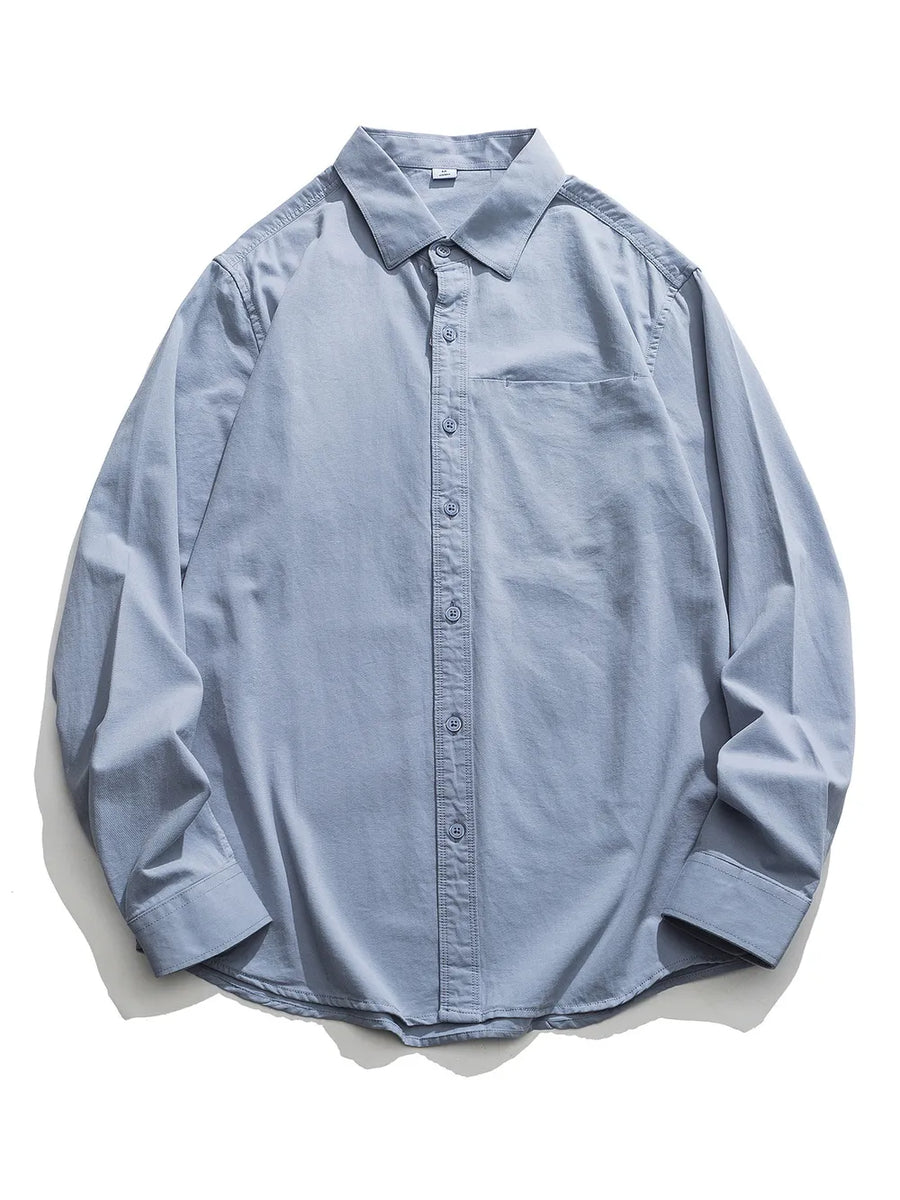 Sky blue cotton men's long sleeve button-down shirt with chest pocket.