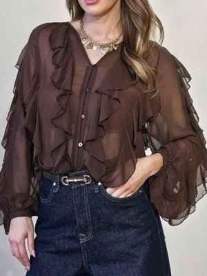 Brown sheer long-sleeve blouse with ruffled details and button front.