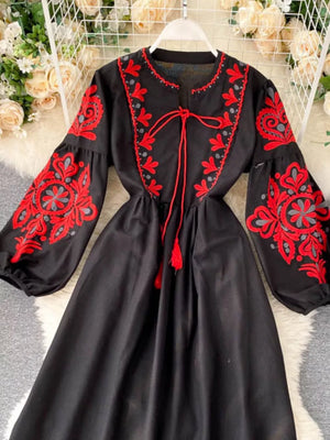 Black maxi dress with red embroidery and balloon sleeves