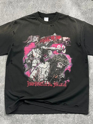 Black oversized ripped graphic tee with Jesus crucifixion print and distressed details.