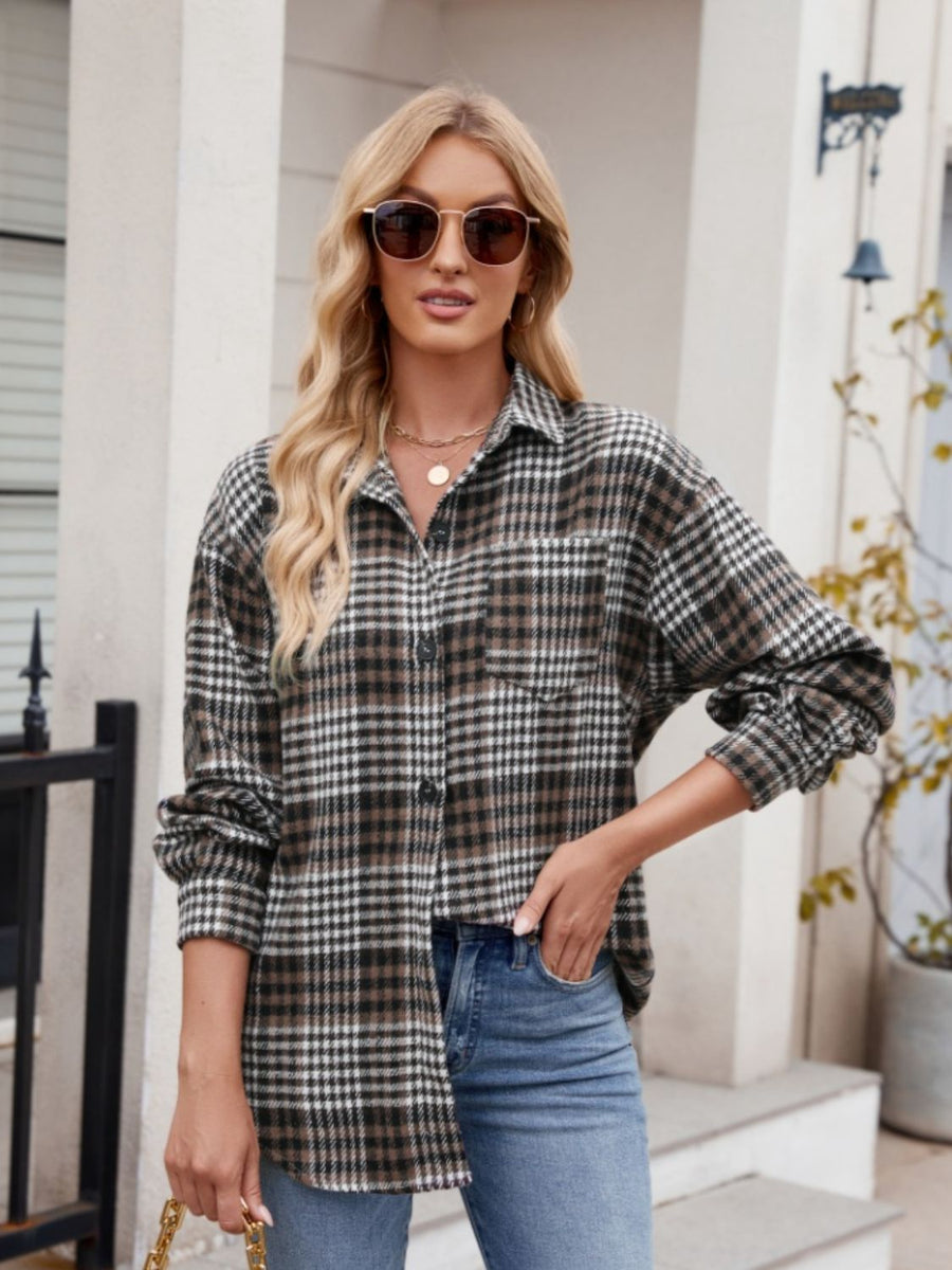 Oversized plaid shirt jacket in brown and black with a chest pocket and button front.