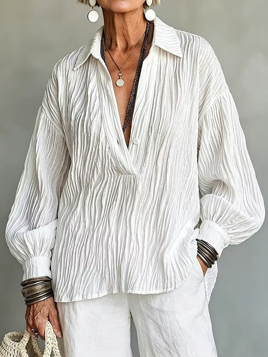 100% polyester Care instructions: Machine wash cold blouse in White with relaxed silhouette