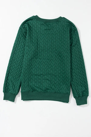 Dark green textured sweatshirt with cable knit pattern, crewneck, and long sleeves.