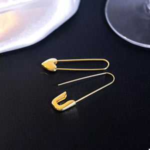gold earrings with drop and pin closure